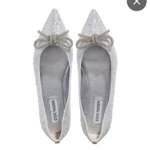 You'll love Madden's silver flats! Pointy toed, bow topped beaut!​​